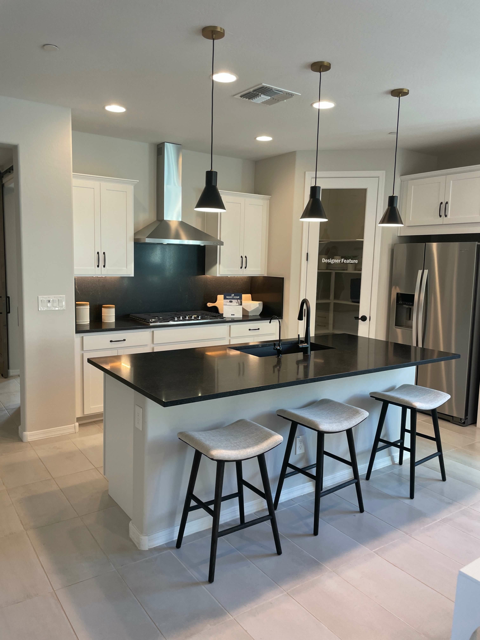 Explore a modern kitchen in a Vistancia home, highlighting luxury design in one of the fastest-growing cities in Arizona.